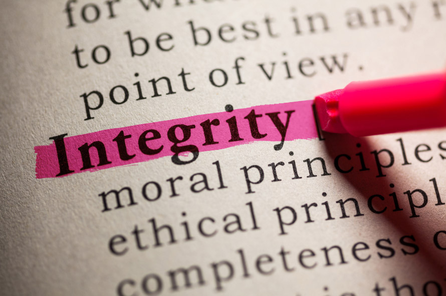 Highlighting the word Integrity on a dictionary