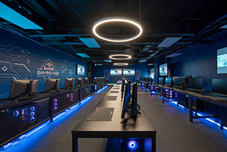 Redbull Gaming Hub interior with computer stations and high-tech lighting