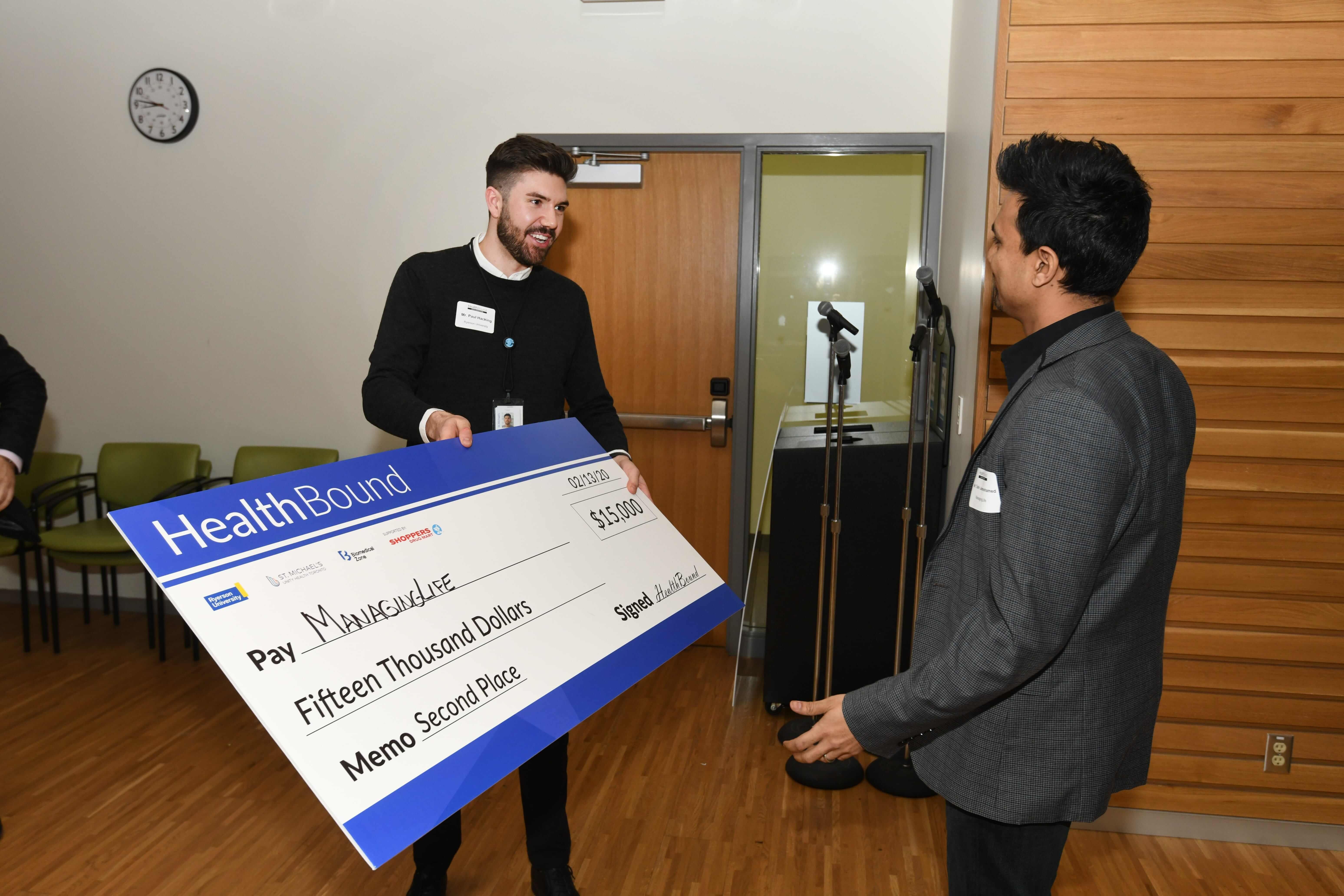 Winner of Healthbound pitch competition receives cheque