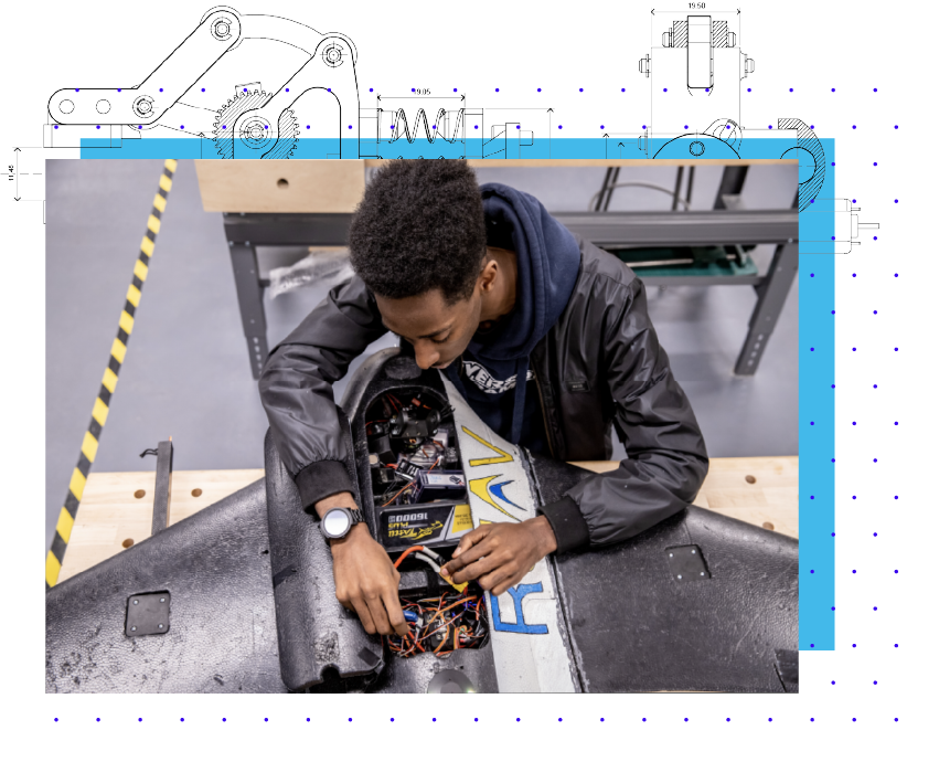 Rosor team member working on the mechanical wiring of a drone.